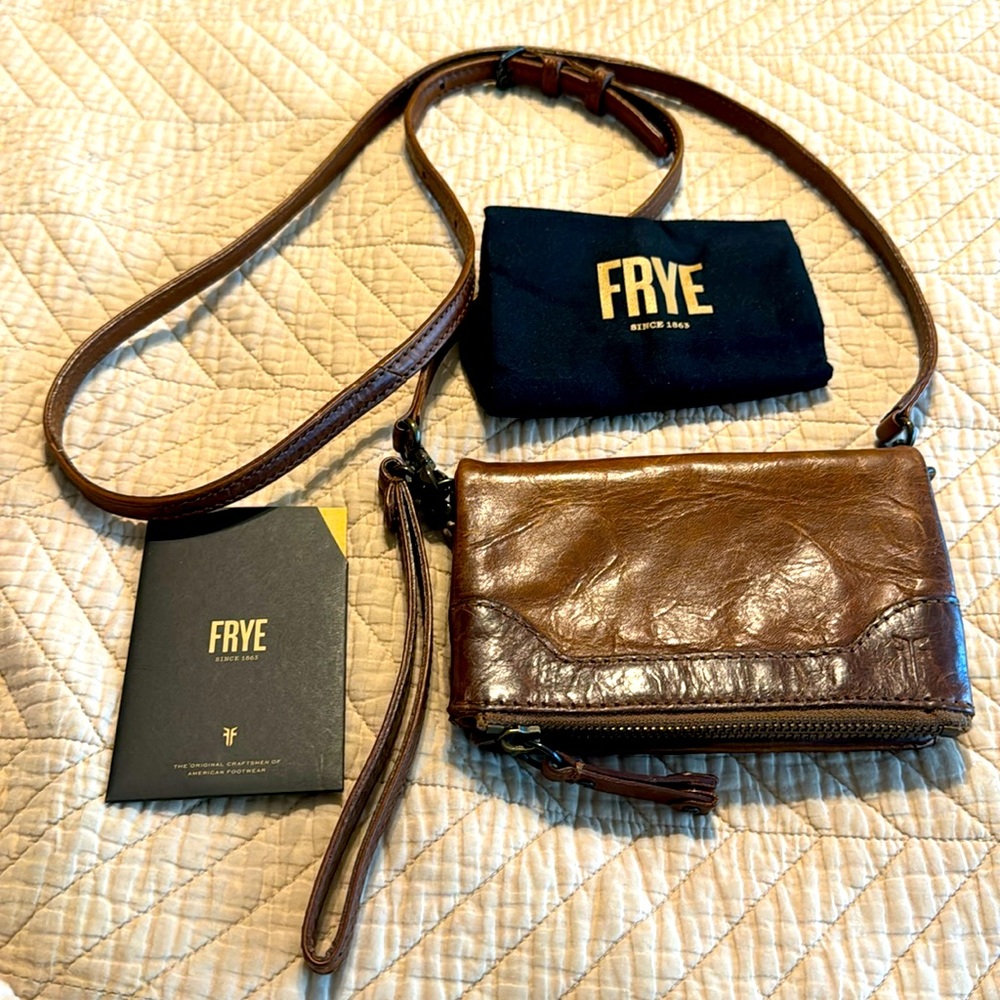 Frye brand crossbody or wristlet purse. New never worn but does not have tags.